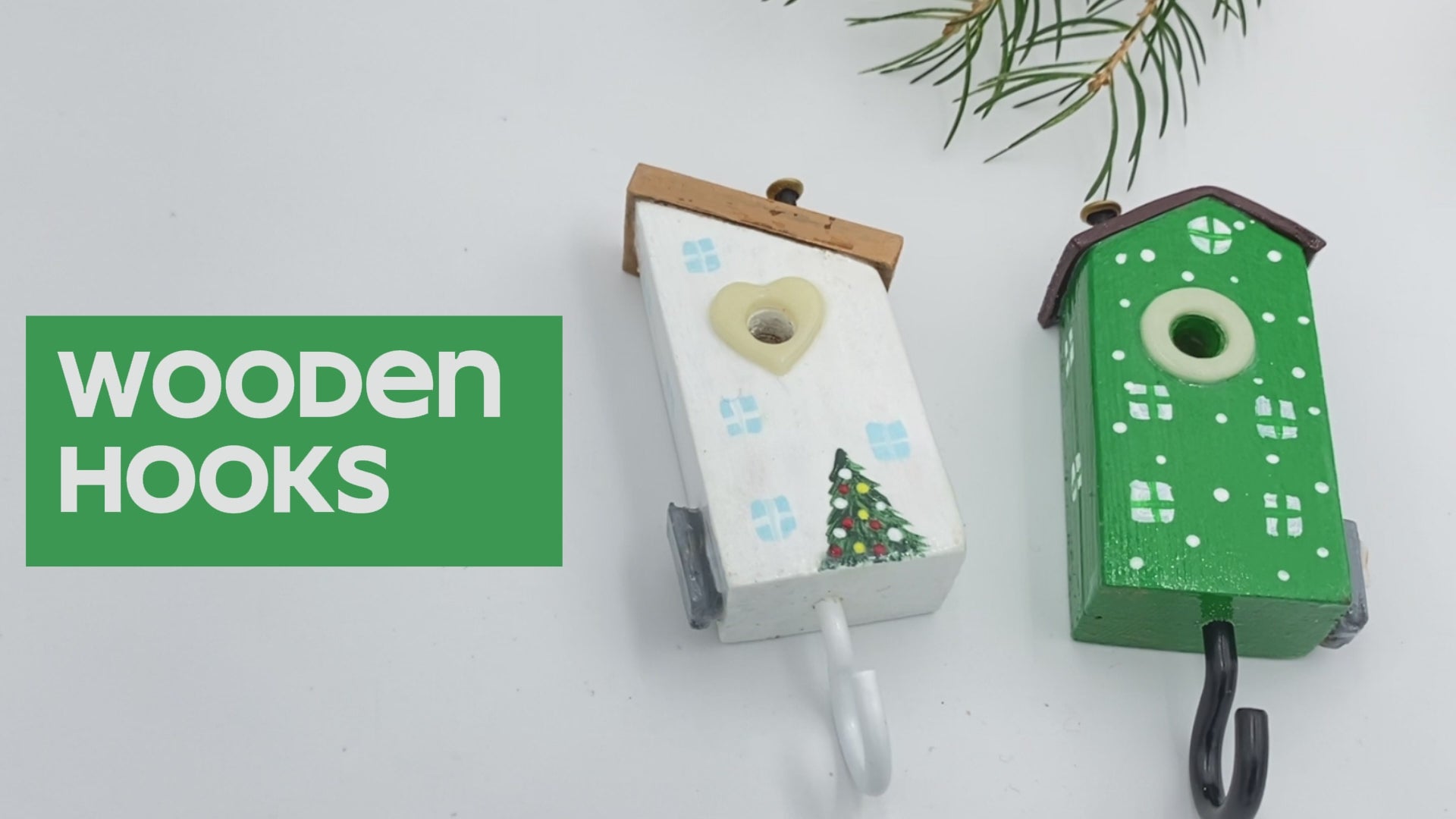 Set of two wooden hooks made in the shape of small houses decorated for Christmas - Ornamentico shop