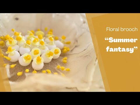 Handmade pale-yellow floral brooch crafted from organza fabric, beads and sequins