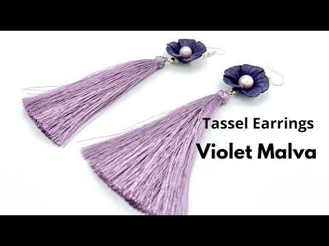 Handmade earrings featuring violet polymer clay flowers, river pearls and long rayon tassels - Ornamentico shop
