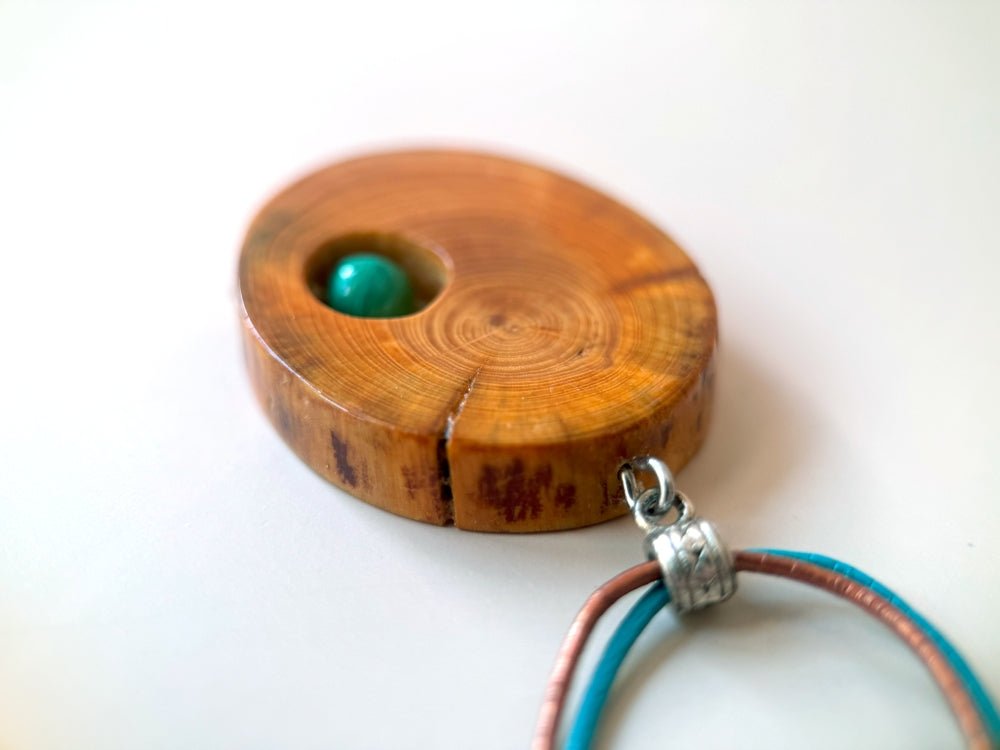 Handmade small wooden pendant crafted from polished and lacquered beech wood - Ornamentico shop