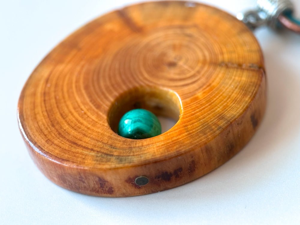 Handmade small wooden pendant crafted from polished and lacquered beech wood - Ornamentico shop