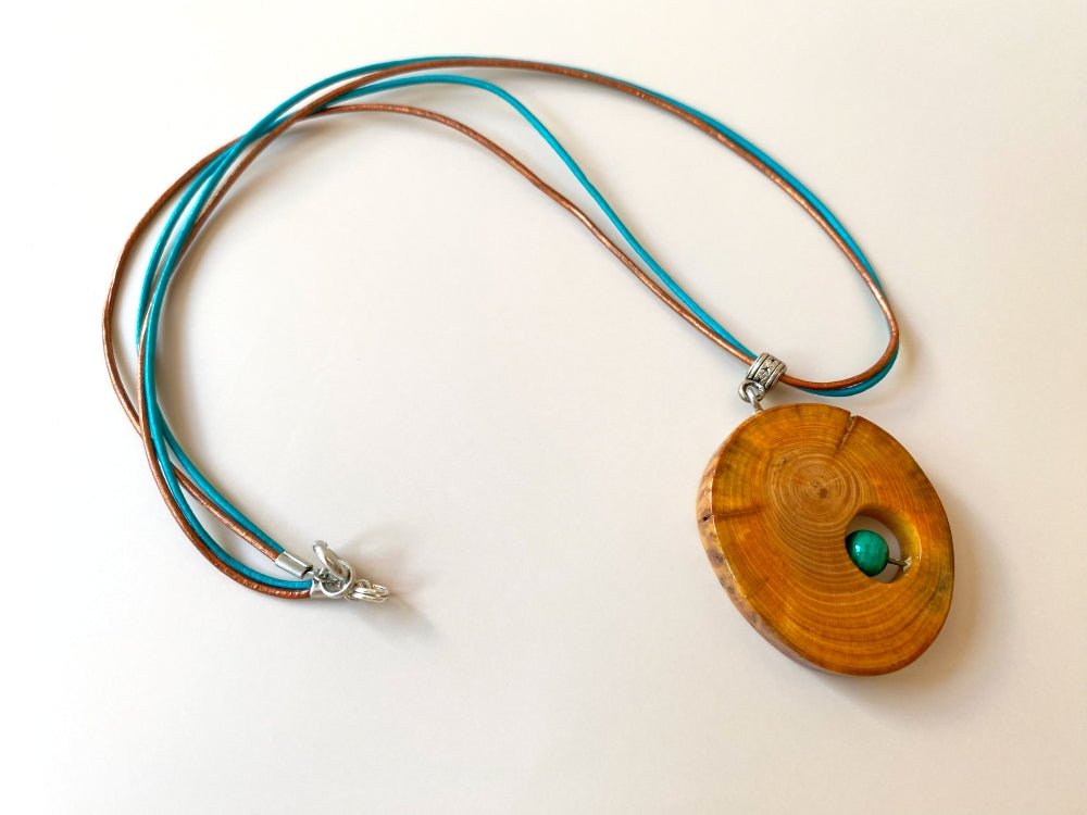 Handmade small wooden pendant crafted from polished and lacquered beech wood - Ornamentico shop