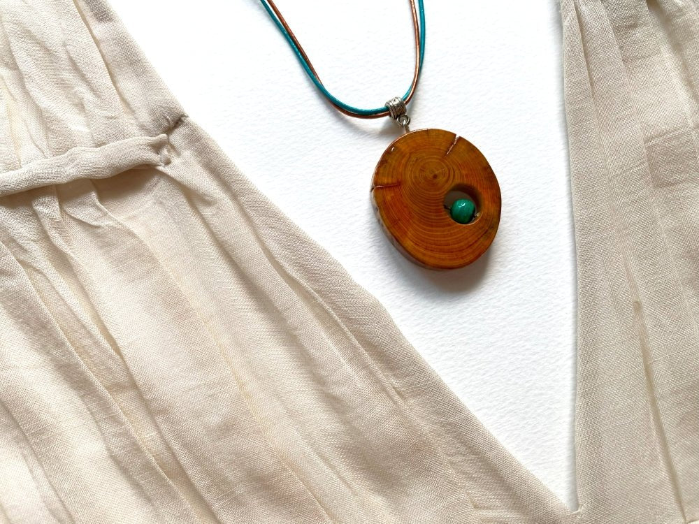 Handmade small wooden pendant crafted from polished and lacquered beech wood - Ornamentico shop