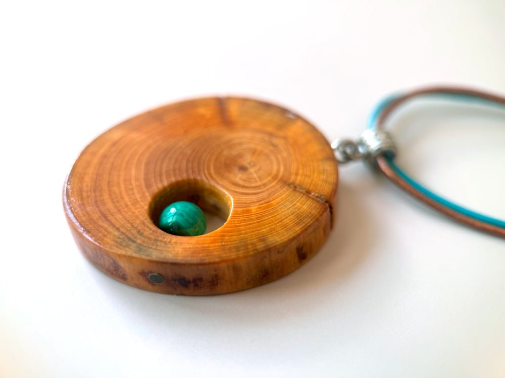 Handmade small wooden pendant crafted from polished and lacquered beech wood - Ornamentico shop