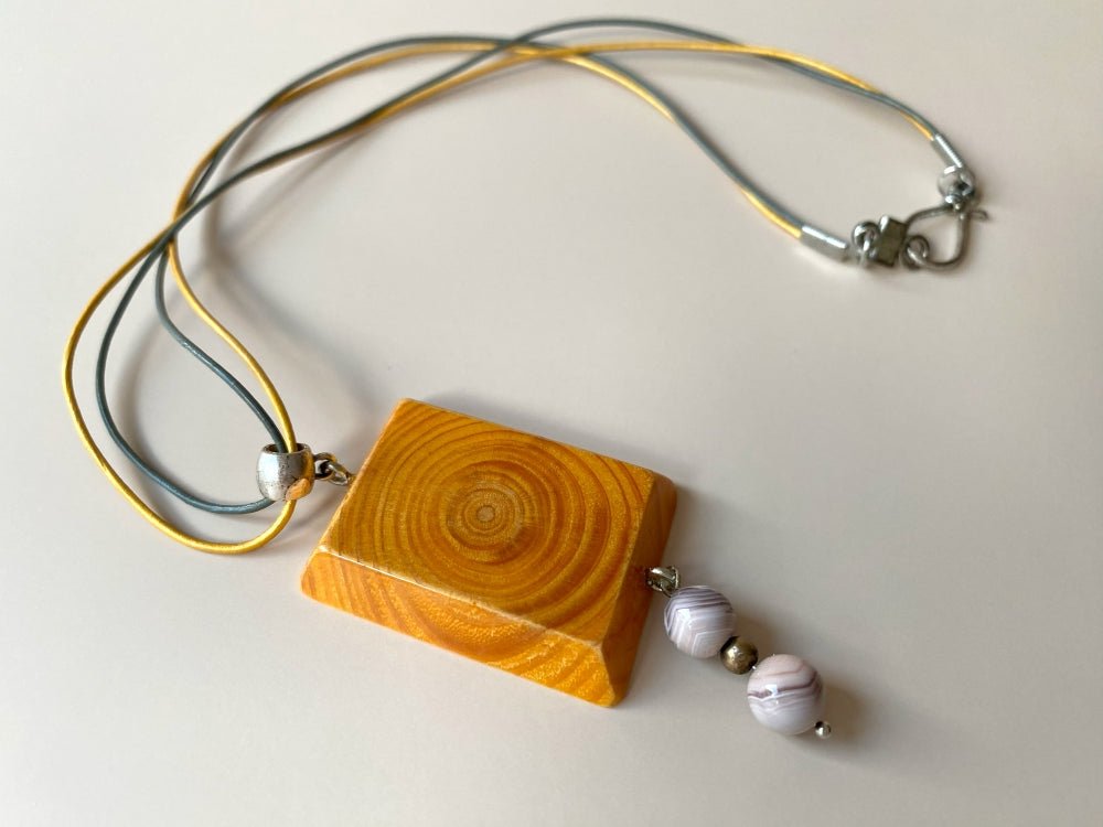 Handmade small wooden pendant crafted from beech wood. Complimented with two agate stones - Ornamentico shop