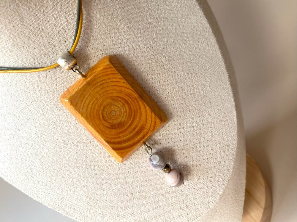 Handmade small wooden pendant crafted from beech wood. Complimented with two agate stones - Ornamentico shop