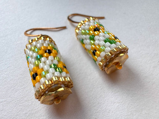Beaded dangle earrings featuring bright sunflowers crafted in peyote stitch technique with Miyuki Delica beads