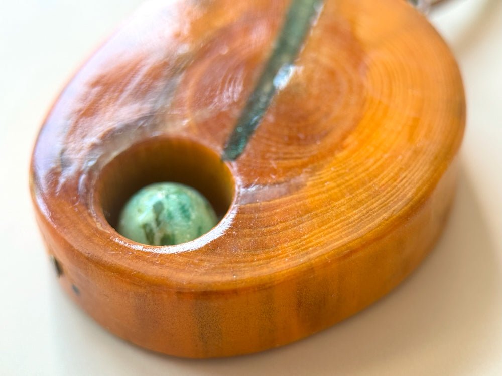 Handmade wooden pendant. Made of polished and lacquered beech wood with one Peruvian turquoise stone - Ornamentico shop