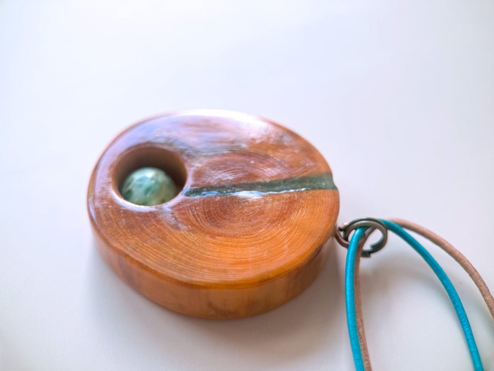 Handmade wooden pendant. Made of polished and lacquered beech wood with one Peruvian turquoise stone - Ornamentico shop