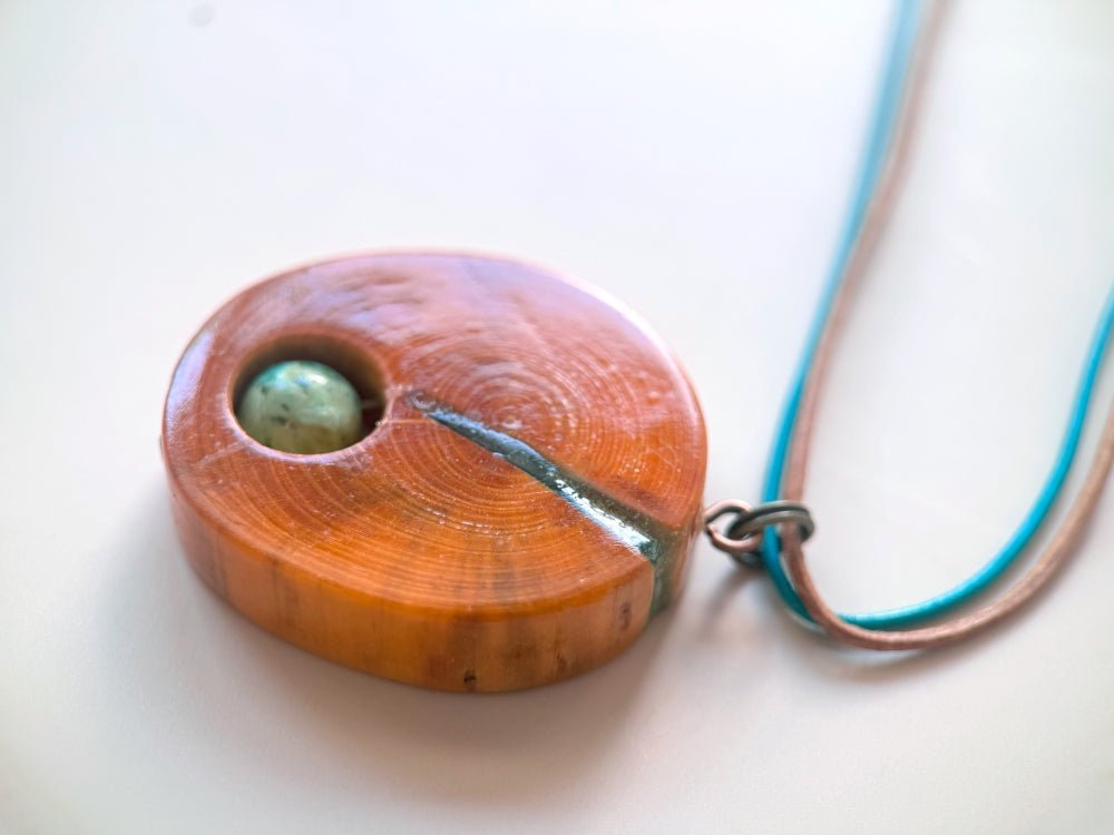 Handmade wooden pendant. Made of polished and lacquered beech wood with one Peruvian turquoise stone - Ornamentico shop