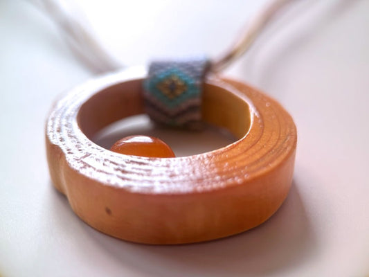 Wooden pendant with amber, crafted from polished and lacquered beech wood - Ornamentico shop