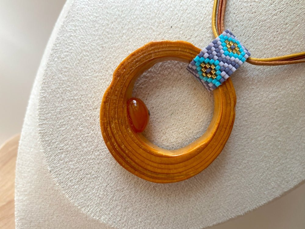 Wooden pendant with amber, crafted from polished and lacquered beech wood - Ornamentico shop