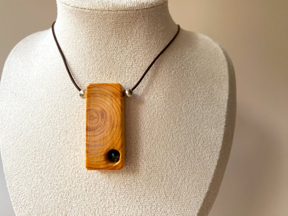 Lacquered wooden pendant with tourmaline bead. Beech wood, pink tourmaline bead, silver coated fittings - Ornamentico shop