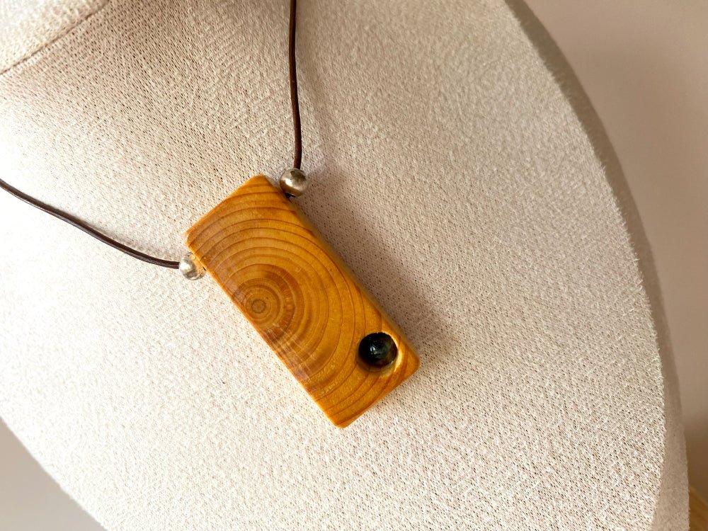 Lacquered wooden pendant with tourmaline bead. Beech wood, pink tourmaline bead, silver coated fittings - Ornamentico shop