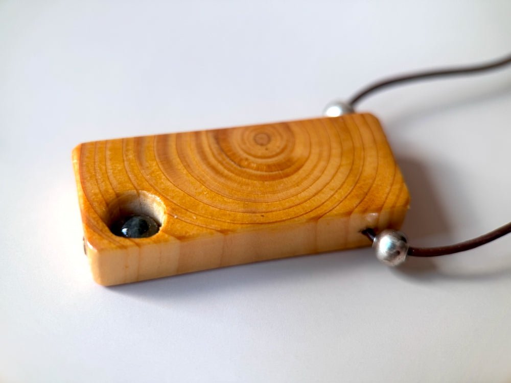 Lacquered wooden pendant with tourmaline bead. Beech wood, pink tourmaline bead, silver coated fittings - Ornamentico shop