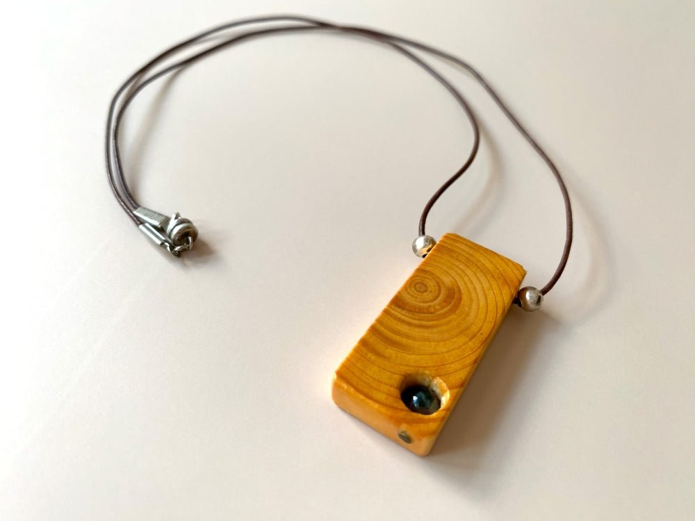Lacquered wooden pendant with tourmaline bead. Beech wood, pink tourmaline bead, silver coated fittings - Ornamentico shop