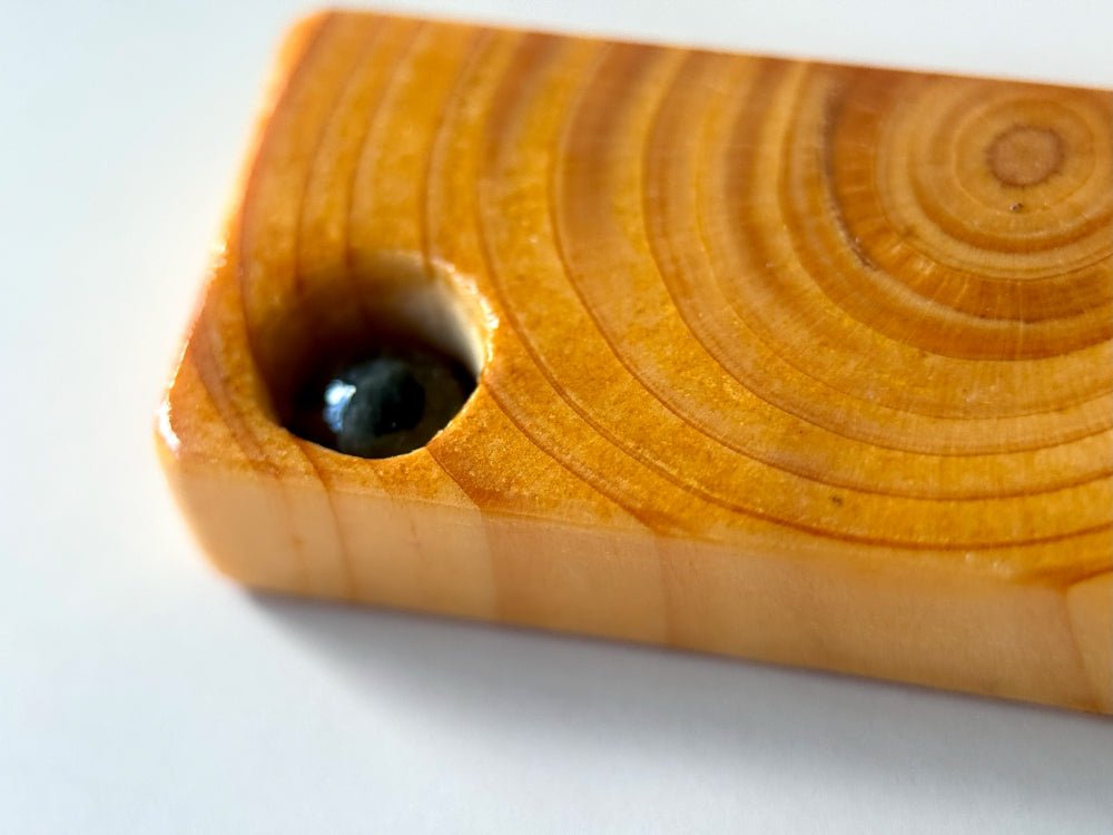 Lacquered wooden pendant with tourmaline bead. Beech wood, pink tourmaline bead, silver coated fittings - Ornamentico shop