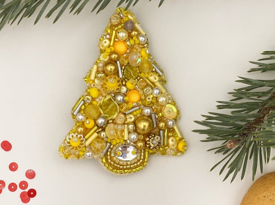 Handmade brooch in the shape of Xmas tree made of glass beads, Miyuki beads, bugle beads and jasper stone - Ornamentico shop