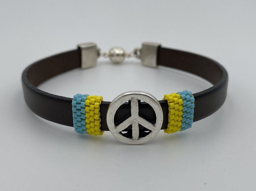 Handmade men's bracelet from leather decorated with large slide bead and inserts from beads Miyuki - Ornamentico shop