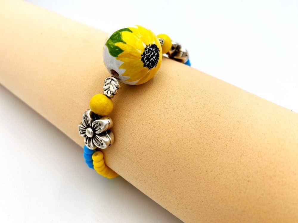 Boho style bracelet from wooden beads crafted from hand-painted wooden bead in colors of Ukrainian flag - Ornamentico shop