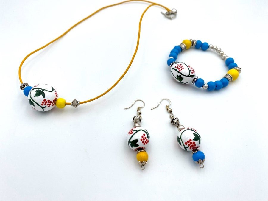 Boho style elegant earrings from hand painted wooden beads "Kalyna" crafted in colors of Ukrainian flag - Ornamentico shop