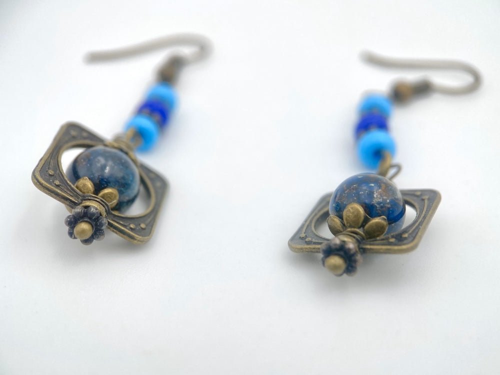 Handmade earrings with shattuckite stone from South Africa framed in bronze floral fitting - Ornamentico shop