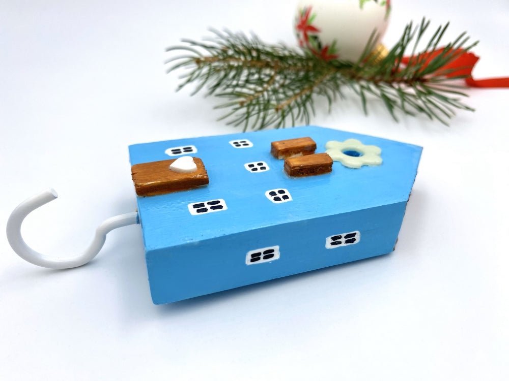 Handmade wooden hook crafted in the shape of a light blue house - Ornamentico shop