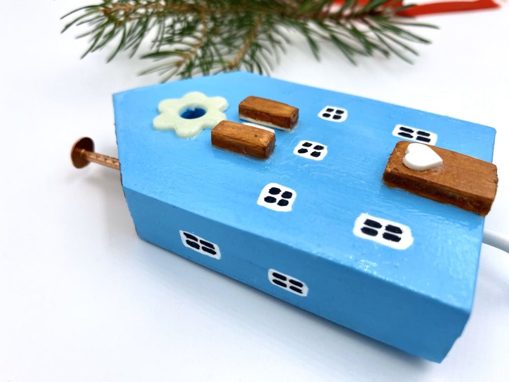 Handmade wooden hook crafted in the shape of a light blue house - Ornamentico shop