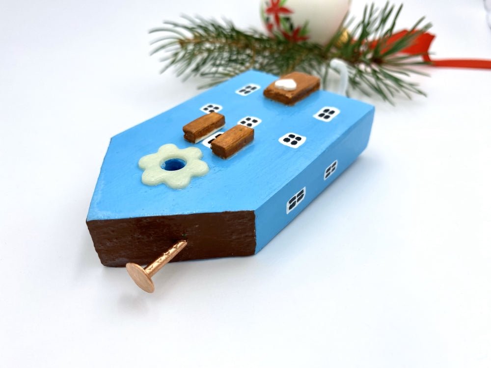 Handmade wooden hook crafted in the shape of a light blue house - Ornamentico shop