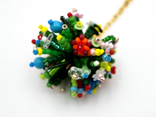 Handmade asymmetric earrings made in sculptural beading technique featuring bright floral design accented by wood - Ornamentico Group