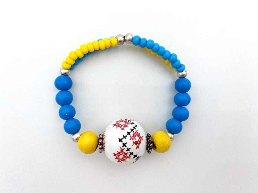 Handmade bracelet crafted in Boho style from hand painted wooden bead - Ornamentico shop