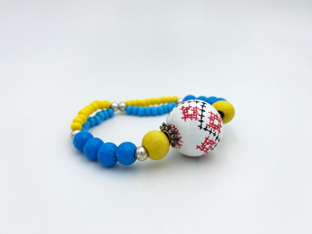 Handmade bracelet crafted in Boho style from hand painted wooden bead - Ornamentico shop