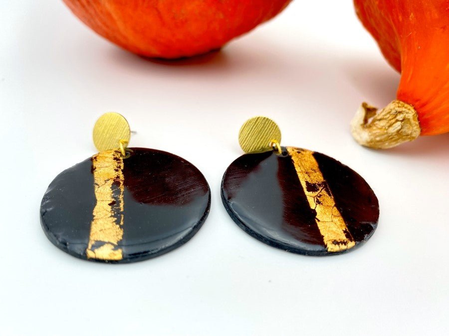 Handmade earrings in black and gold colors from polymer clay with gold plated studs - Ornamentico shop