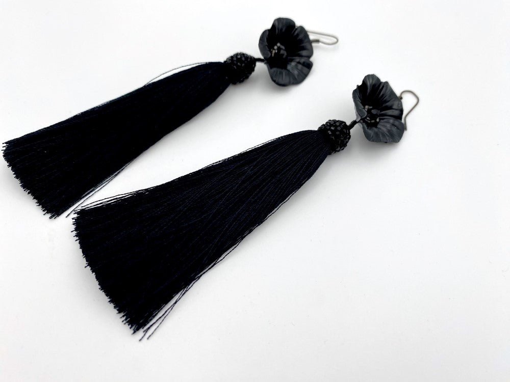 Handmade earrings featuring big polymer clay flower, faceted glass beads and long rayon tassels - Ornamentico shop
