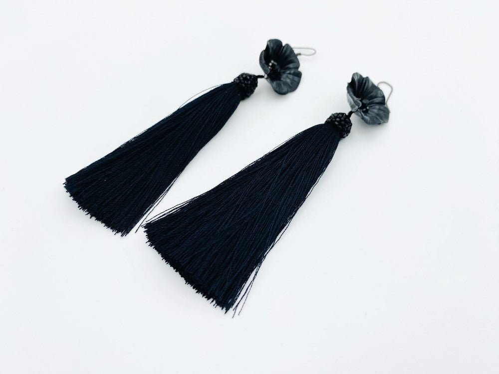 Handmade earrings featuring big polymer clay flower, faceted glass beads and long rayon tassels - Ornamentico shop