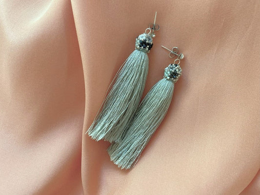 Handmade earrings are crafted from a shimmering mint tassel which is covered with a floral cap - Ornamentico shop