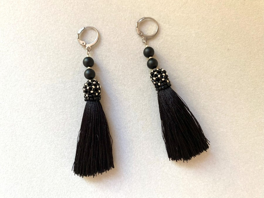 Handmade earrings are crafted from black tassels, covered with a floral cap made from Miyuki beads - Ornamentico shop