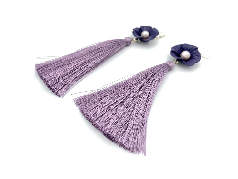Handmade earrings featuring violet polymer clay flowers, river pearls and long rayon tassels - Ornamentico shop