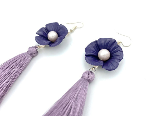 Handmade earrings featuring violet polymer clay flowers, river pearls and long rayon tassels - Ornamentico shop
