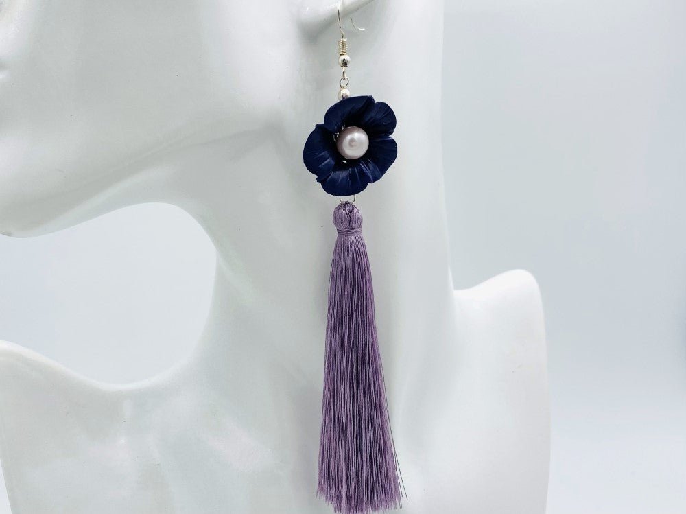 Handmade earrings featuring violet polymer clay flowers, river pearls and long rayon tassels - Ornamentico shop