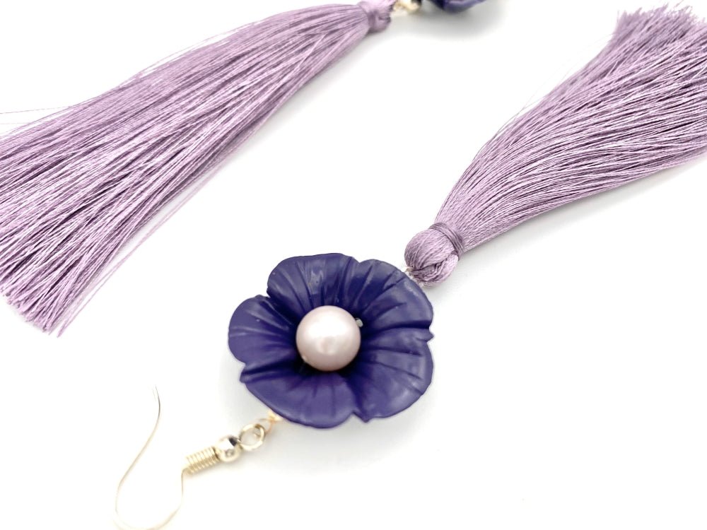 Handmade earrings featuring violet polymer clay flowers, river pearls and long rayon tassels - Ornamentico shop