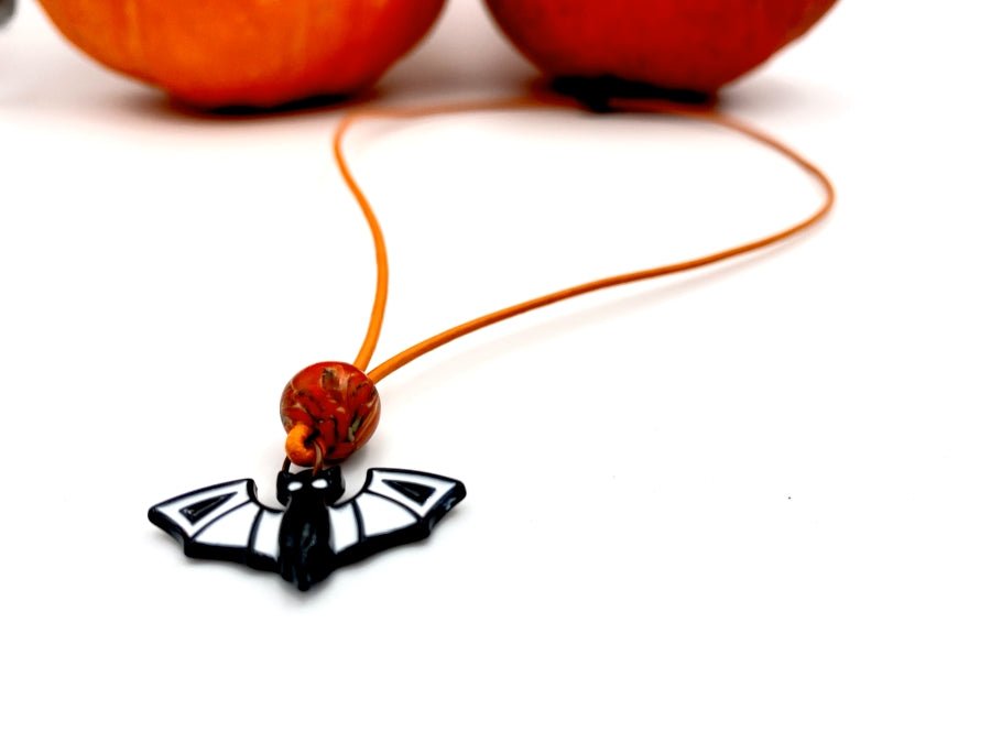 Handmade leather necklace for Halloween with glass bat charm and clay bead - Ornamentico shop