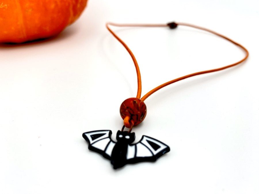 Handmade leather necklace for Halloween with glass bat charm and clay bead - Ornamentico shop