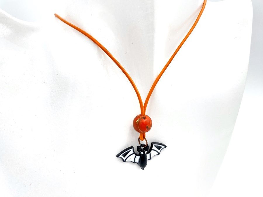 Handmade leather necklace for Halloween with glass bat charm and clay bead - Ornamentico shop
