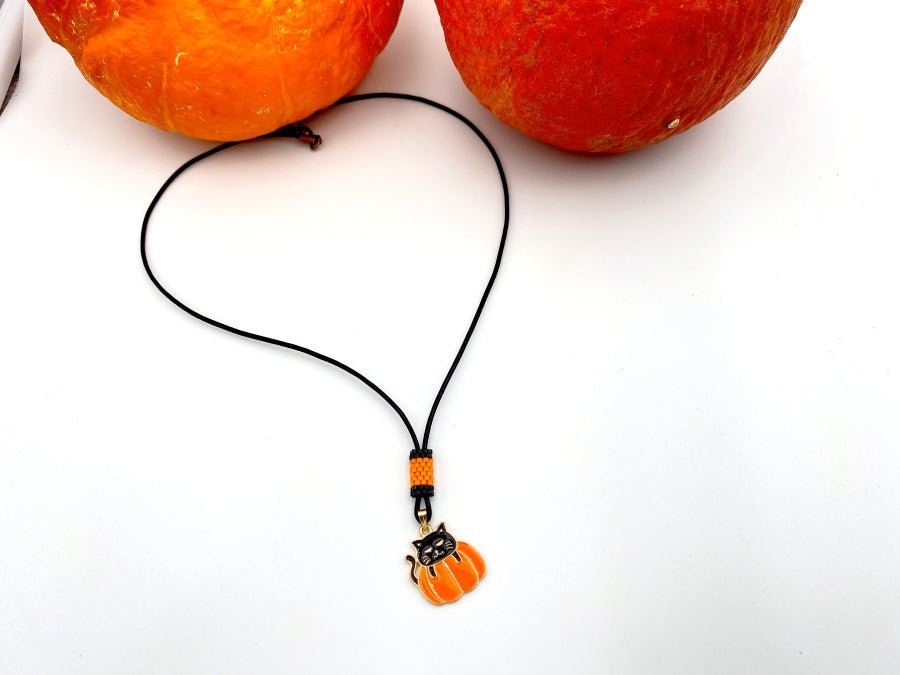 Handmade necklace on leather cord with enameled charm and beaded inlay - Ornamentico shop