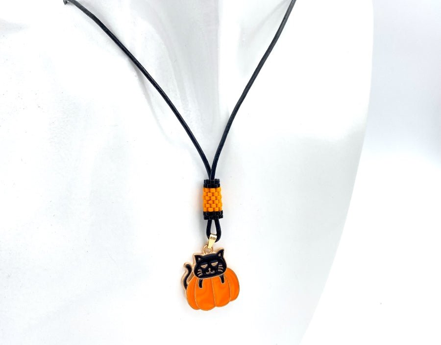 Handmade necklace on leather cord with enameled charm and beaded inlay - Ornamentico shop