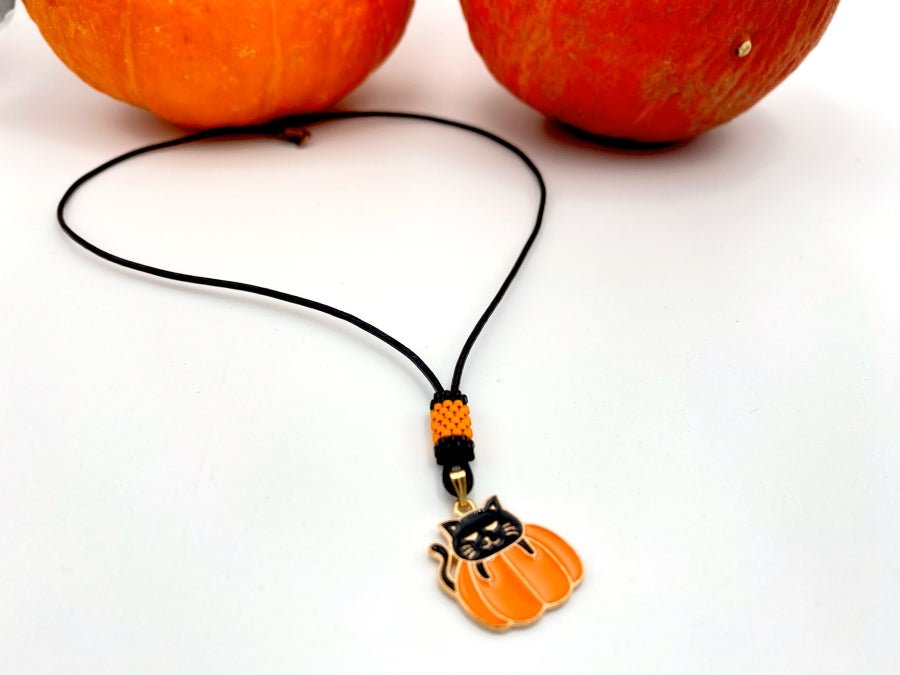 Handmade necklace on leather cord with enameled charm and beaded inlay - Ornamentico shop