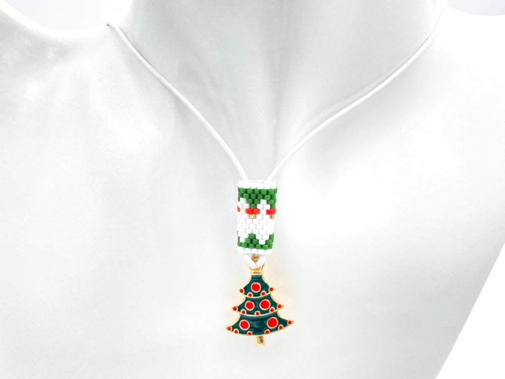 Handmade necklace is featuring elegant charm in the shape of Christmas tree accented with beaded inlay - Ornamentico shop