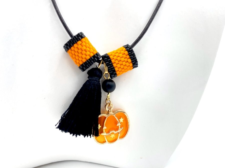 Handmade leather necklace with Halloween pumpkin charm and tassel - Ornamentico shop