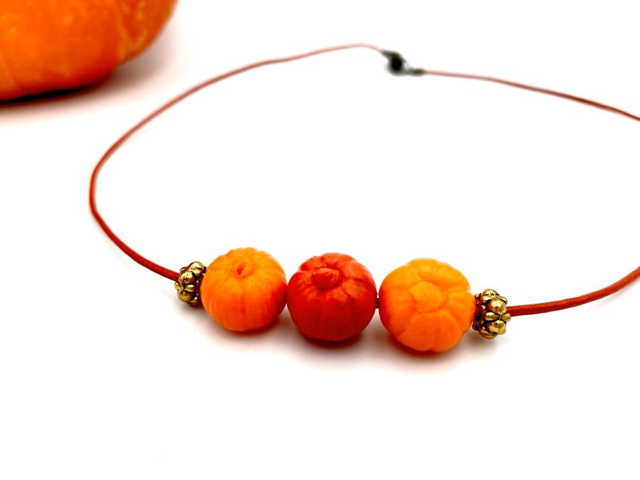 Handmade necklace on leather cord with three pumpkin beads - Ornamentico shop